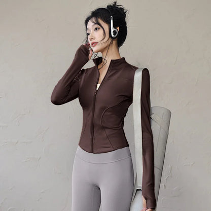 Veste de sport femme légère zippée avec passe-pouces