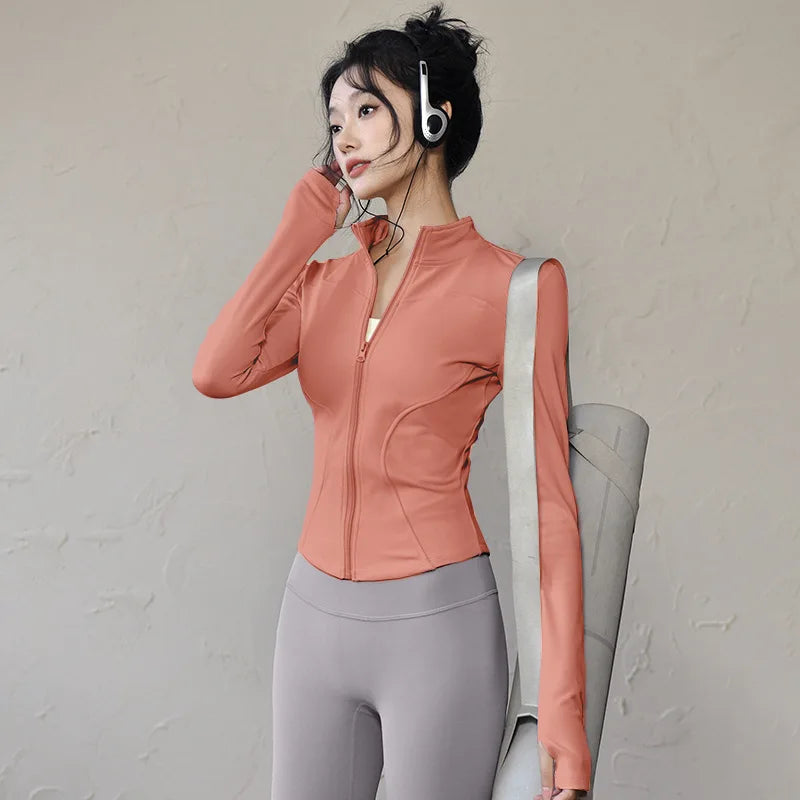 Veste de sport femme légère zippée avec passe-pouces