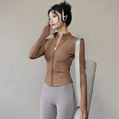 Veste de sport femme légère zippée avec passe-pouces