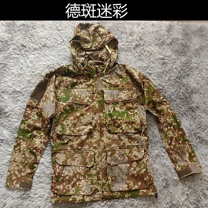 M2 Tactical Windbreaker Jacket – Veste de Travail Camouflée Imperméable à Capuche pour Randonnée, Sports et Activités en Extérieur BLACKBEARD OUTDOOR INDUSTRIES